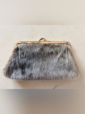 Vintage 1950’s Seal Skin Clutch with Brass Tone Hardware. 2 Clasp Closures.